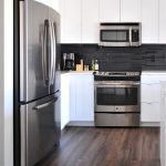 white and stainless steel kitchen
