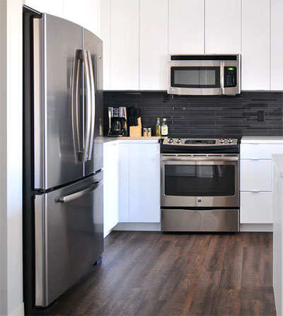 white and stainless steel kitchen
